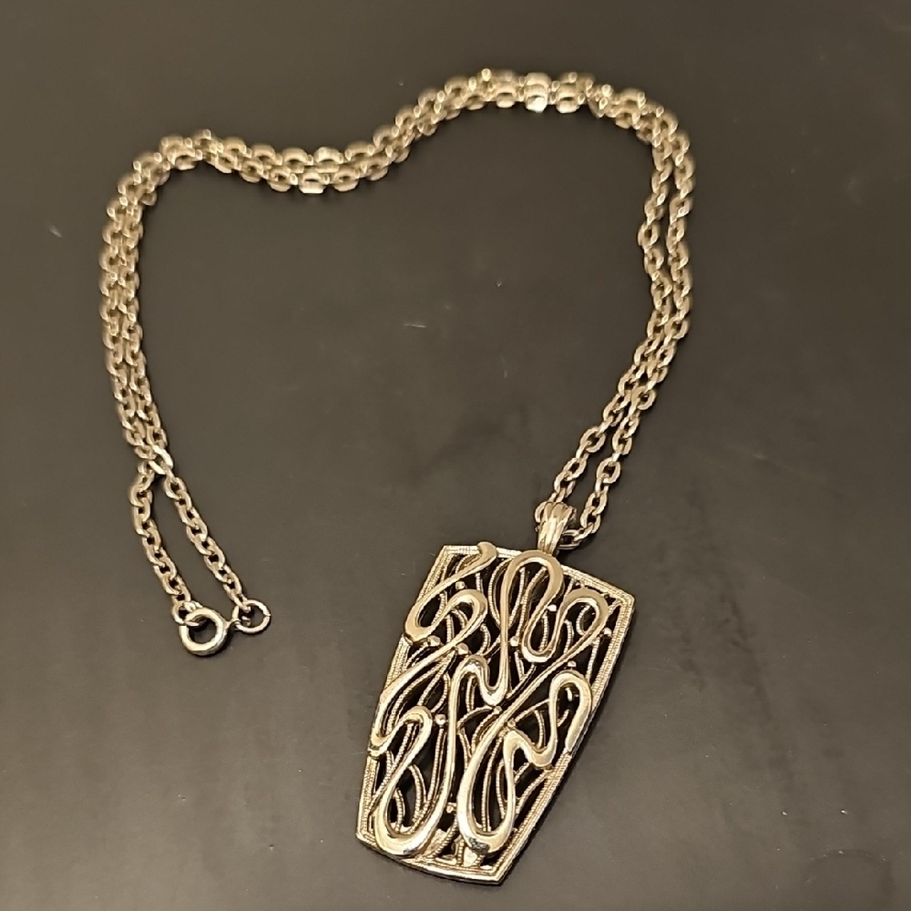 Intricate Silver Pendant Necklace